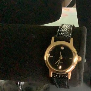 Gold tone watch. Never worn. Needs battery